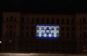 Steagul statului Israel, proiectat pe clădirea Palatului Parlamentului. Gestul denotă un semn de solidaritate în urma războiului declanșat sâmbătă / VIDEO