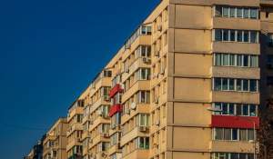 De ce plătești impozit pe terenul de sub bloc dacă stai la etaj. Explicația pe care mulți proprietari nu o cunosc