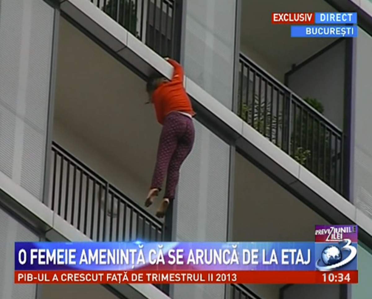 UPDATE Imagini înfiorătoare în cartierul vedetelor! O femeie vrea să se arunce de la etajul 13 al unui bloc!