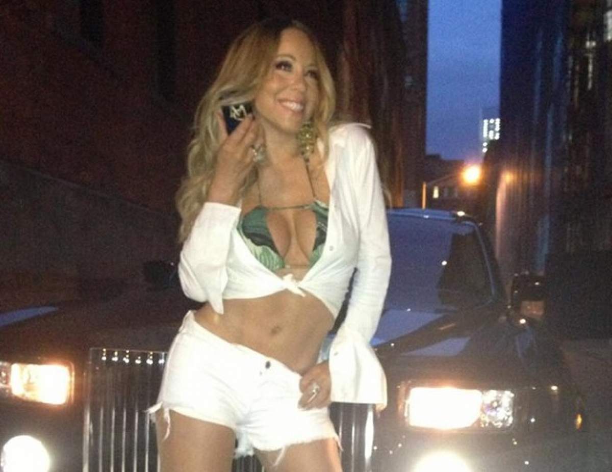 Mariah Carey, cu sânii sufocaţi într-o rochie extrem de mulată!