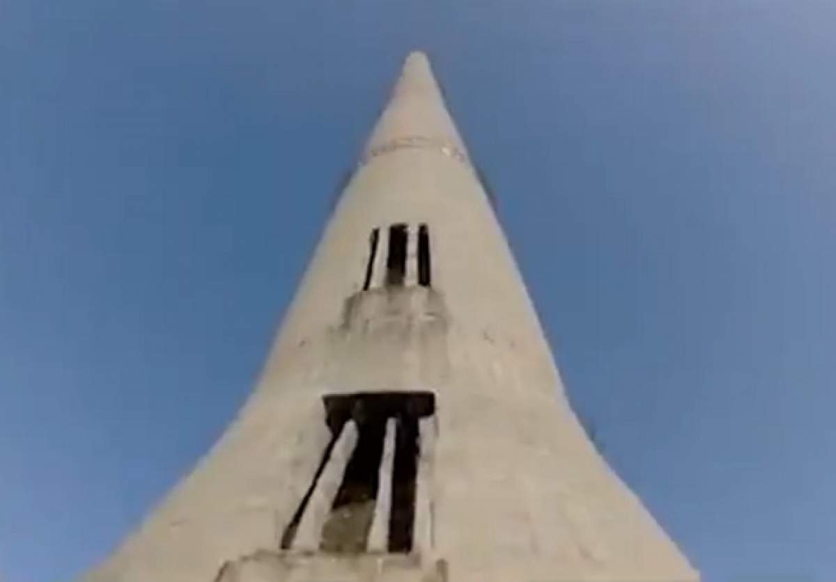 VIDEO / Incredibil! Un român s-a căţărat pe un turn părăsit de 280 de metri şi i-a uimit pe britanici