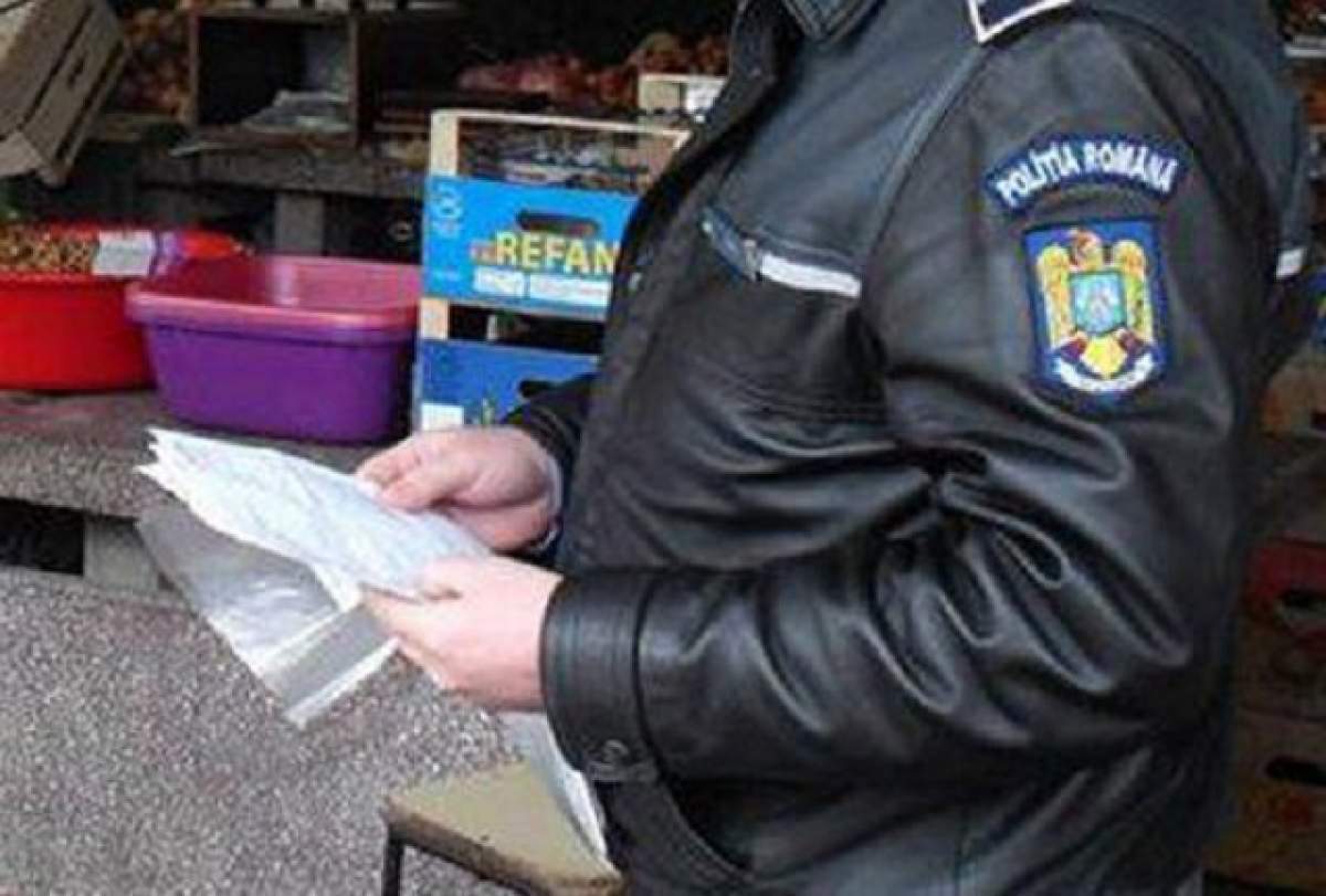 Jaf marca "Poliţia Română"! Agenţi acuzaţi de tâlhărie după ce şi-au umplut sacoşele pentru sărbătorile de iarnă