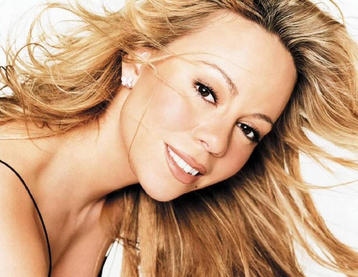 Mariah Carey s-a făcut de râs cu o ţinută prea mulată! Sânii pe jumătate ieşiţi din cupe şi burta imensă i-au oripilat pe fani!