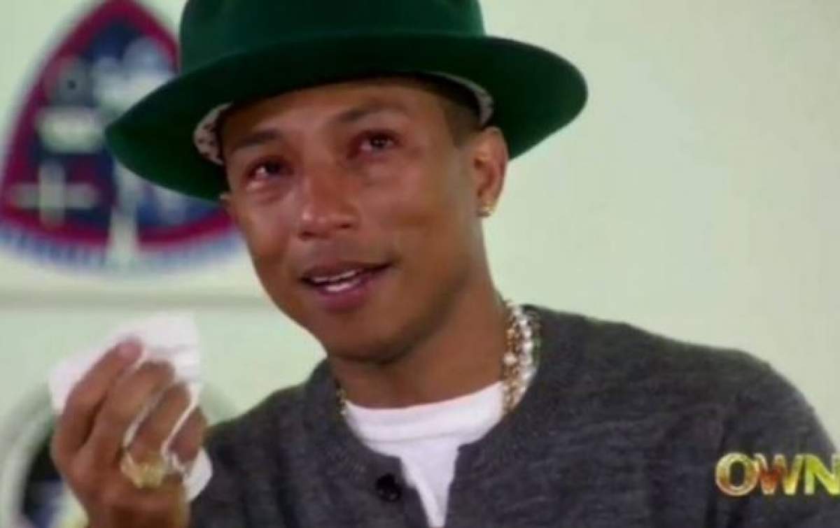 VIDEO "Happy", dar cu lacrimi pe obraji! Pharrell izbucneşte în plans la TV din cauza melodiei care l-a consacrat! Vezi momentul care a emoţionat-o şi pe Oprah