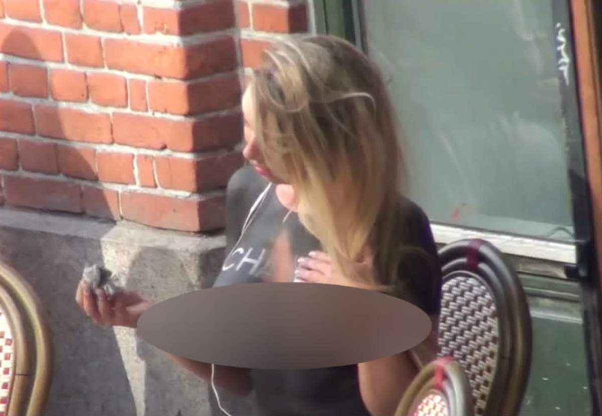VIDEO Mamăăă! Şi-a pictat tricoul pe corp şi a ieşit aproape goală pe stradă! Are nişte sâni superbi!
