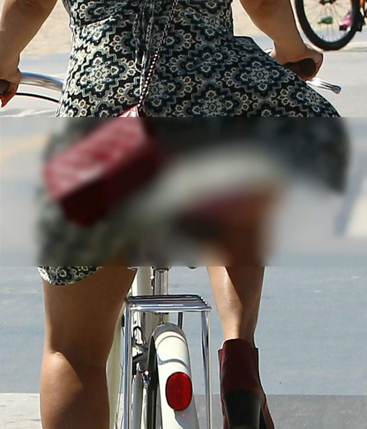 FOTO Ce se întâmplă când porţi o rochie prea largă pe o bicicletă? O super vedetă şi-a arătat tuturor posteriorul!