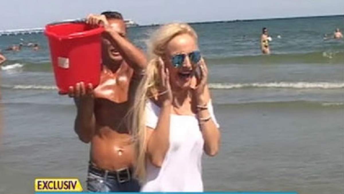 VIDEO / Denisa Botcari a realizat cea mai INCENDIARĂ provocare Ice Bucket! Priveşte-o pe blondă, udă toată, şi fără sutien pe ea