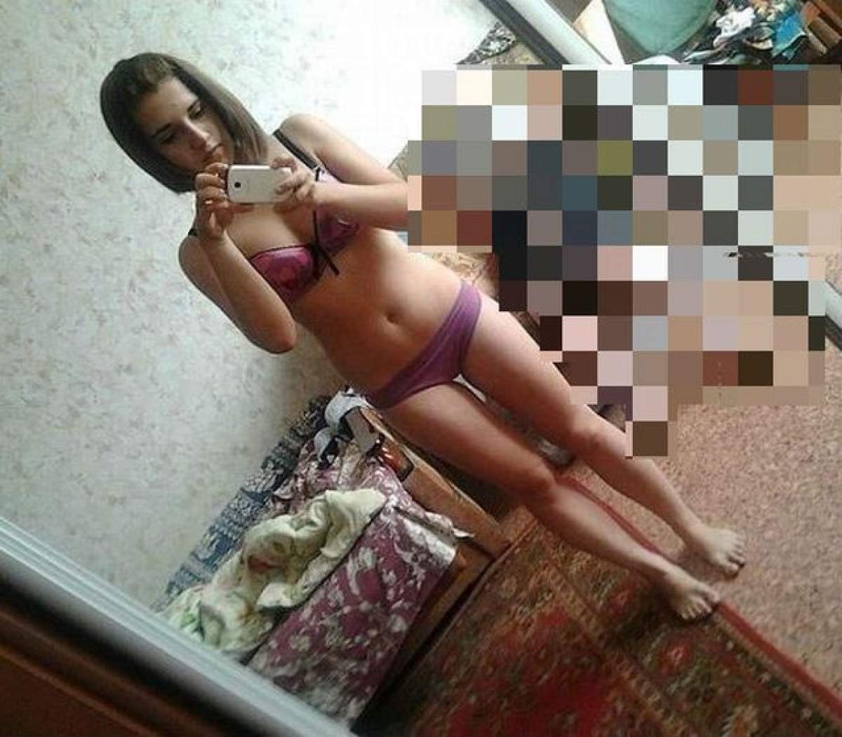 A vrut să-şi facă un SELFIE sexy, însă nu i-a prea ieşit! Detaliul din spatele tinerei a stârnit râsul internauţilor