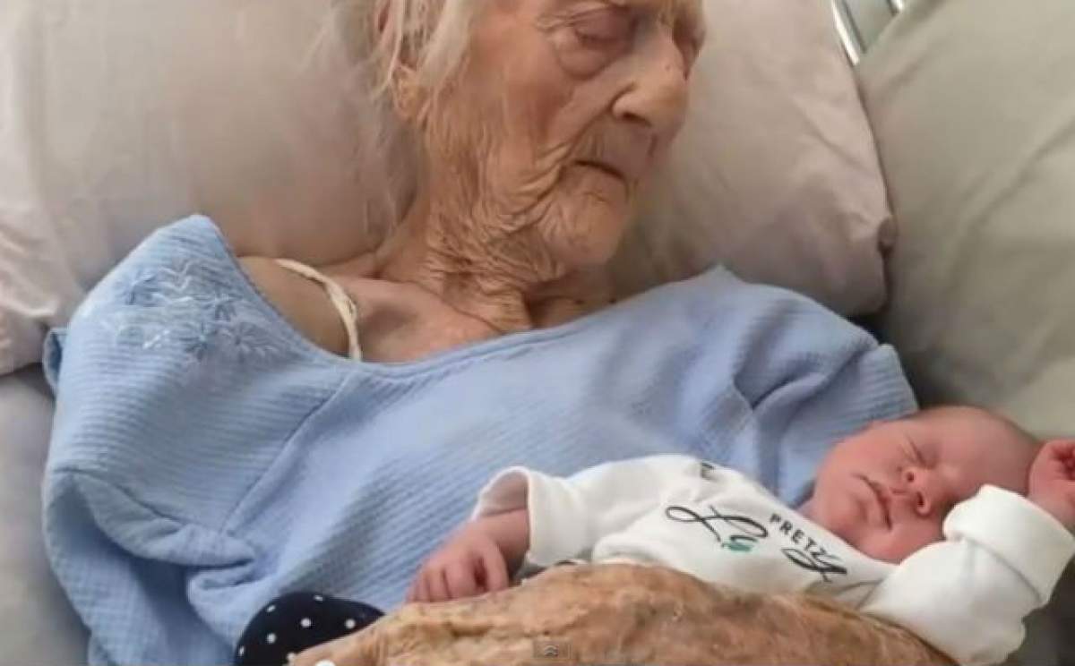 VIDEO/ A trăit doar ca să-şi ţină stră-strănepoata în braţe! Imaginea cu femeia de 101 ani a făcut înconjurul lumii