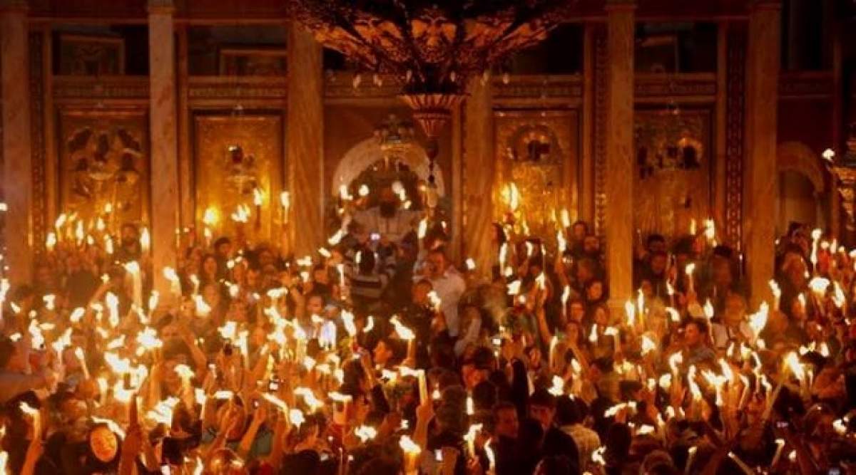 VIDEO INCREDIBIL / Lumina Sfântă de la Ierusalim este o minune sau înşelătorie?