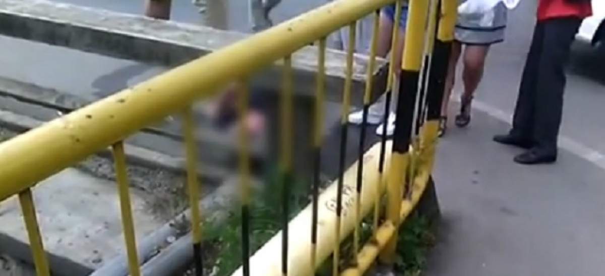 VIDEO REVOLTĂTOR / Se întâmplă în România! Bărbat leşinat lângă spital, ambulanţele trec pe lângă el
