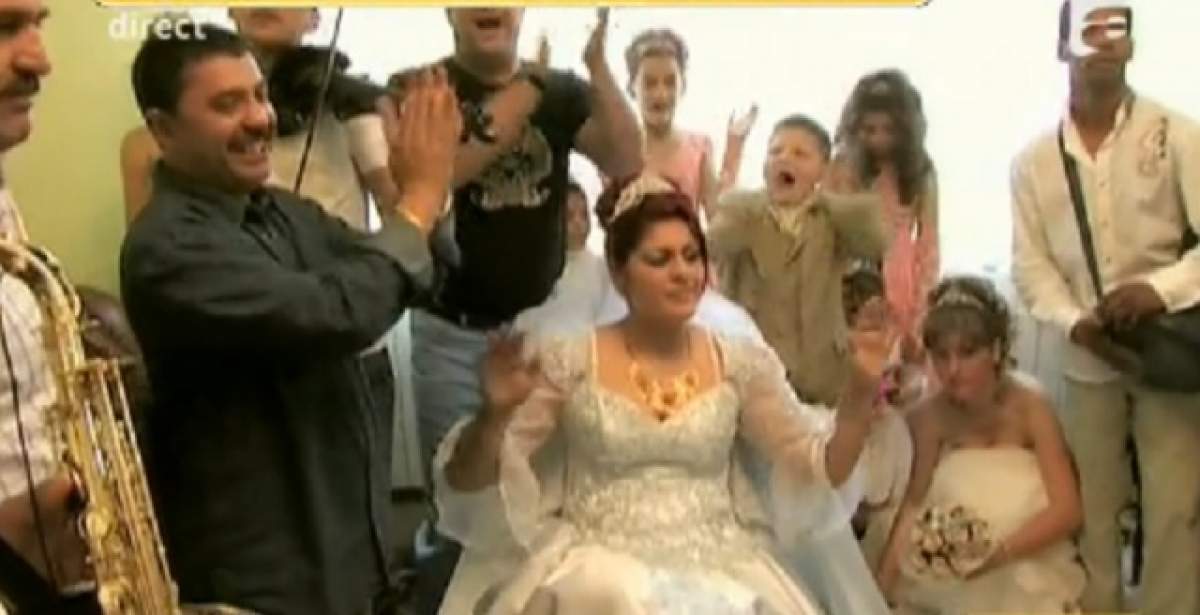 VIDEO / A plouat cu bani, diamante şi rubine! Imagini de la mega nunta din familia lui Nicolae Guţă