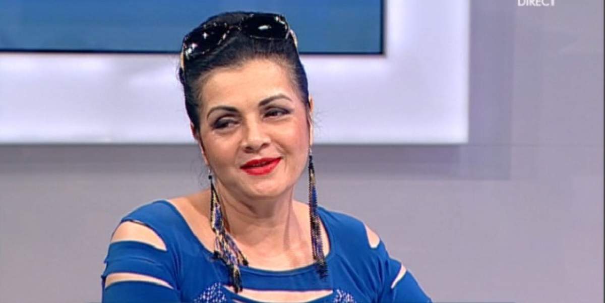 Cornelia Catanga, apariţie caraghioasă într-un studio de televiziune! Nu s-a dezlipit de un accesoriu nepotrivit pentru o încăpere închisă