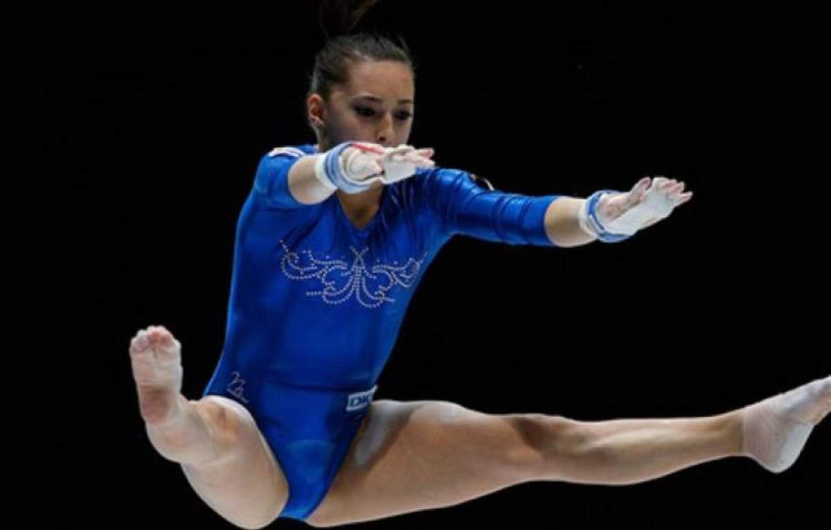 FOTO / O mai ţineţi minte pe micuţa gimnastă Larisa Iordache? Uite în ce domnişoară frumoasă s-a transformat!