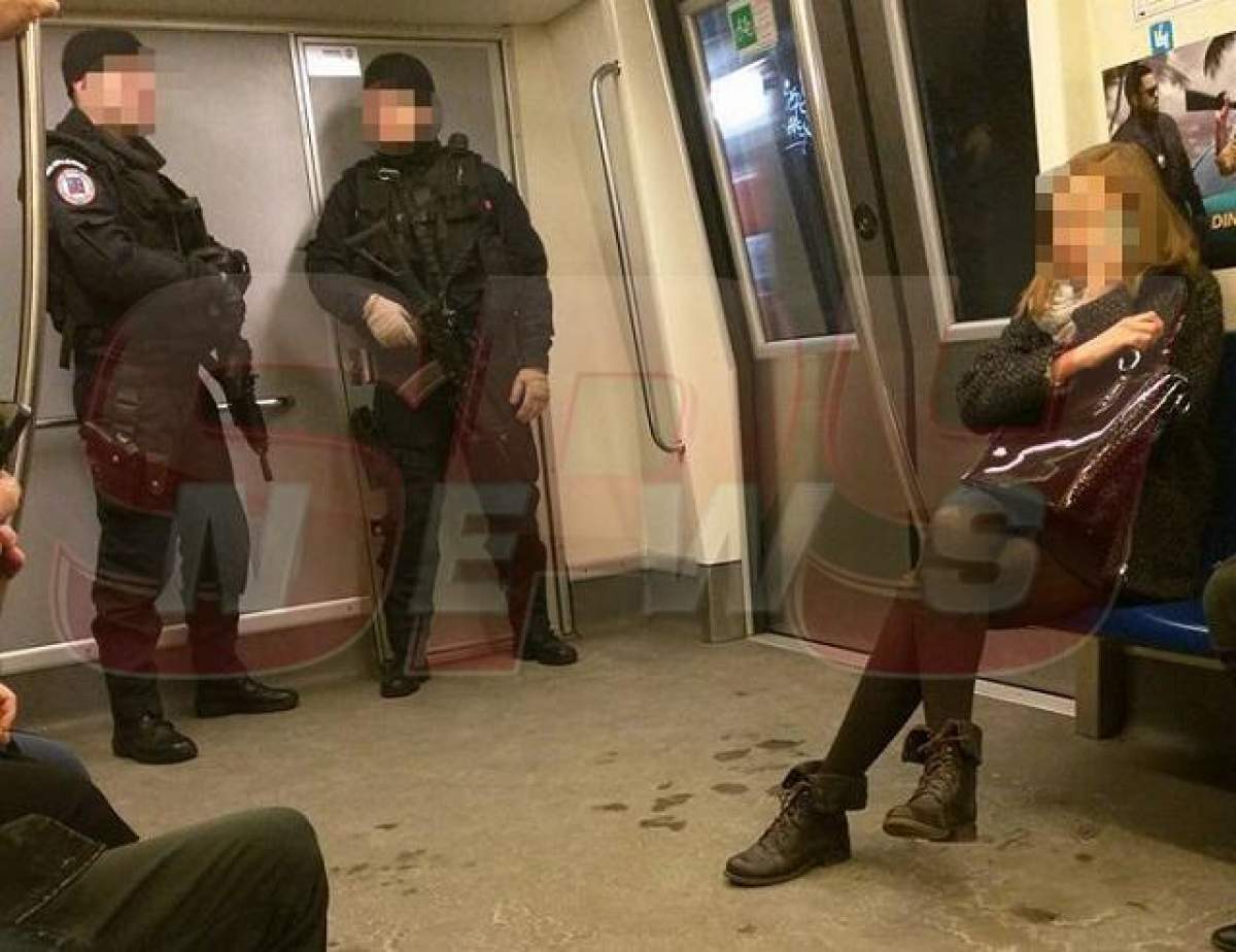 Panică la metrou! Înarmaţi cu mitraliere, printre călători!