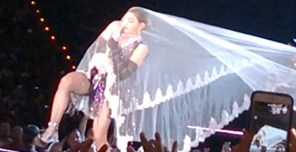 VIDEO / Madonna, gafă colosală pe scenă! S-a făcut de râs, după ce "s-a prins în voal"! Imaginile au făcut înconjurul lumii