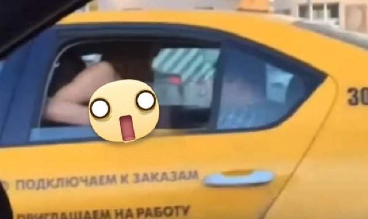 VIDEO / Destrăbălare maximă, nu glumă! A făcut amor în taxi, iar mai apoi a ieşit pe geam! Scene filmate în mijlocul zilei