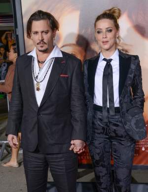 Victima e de fapt agresor? Amber Heard, soţia lui Johnny Depp, arestată pentru violenţă domestică