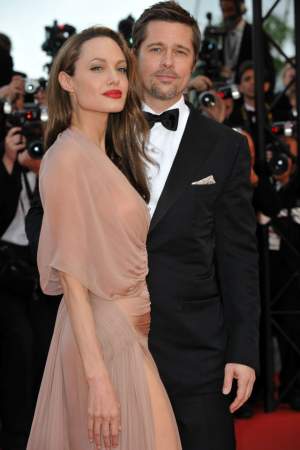 FOTO / Motivul divorţului: Brad Pitt ar fi înşelat-o pe Angelina Jolie!