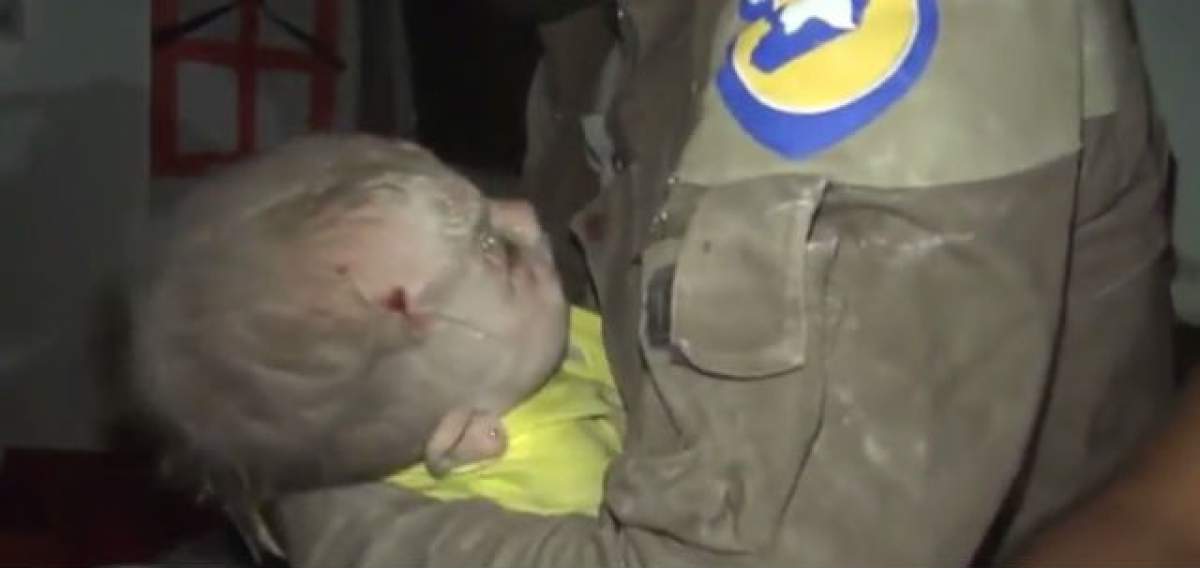 VIDEO / Imaginile care au făcut înconjurul lumii şi au stârnit controverse la nivel înalt! Un bebeluş de doar o lună a supravieţuit în mod miraculos, după un bombardament în Siria