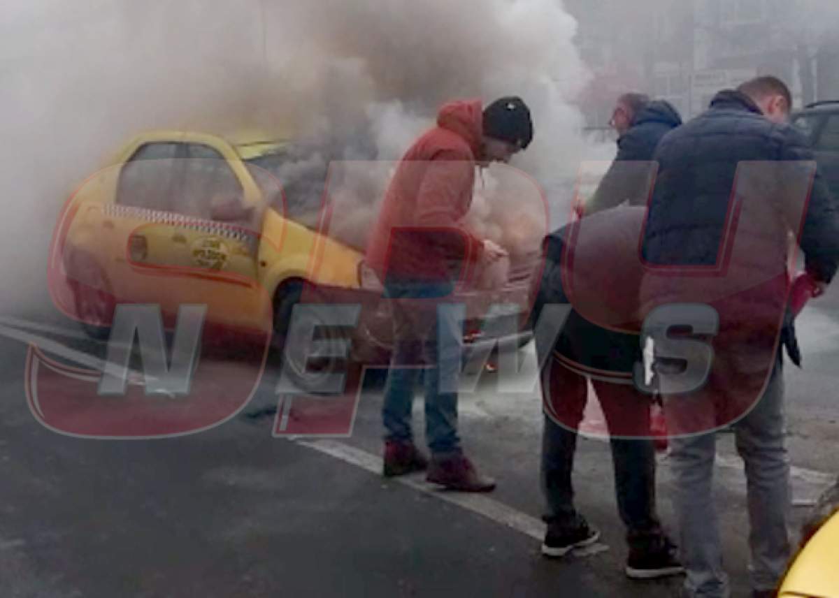 Încă un dezastru în Bucureşti! Zi blestemată! Un taxi a luat foc! Imagini exclusive!