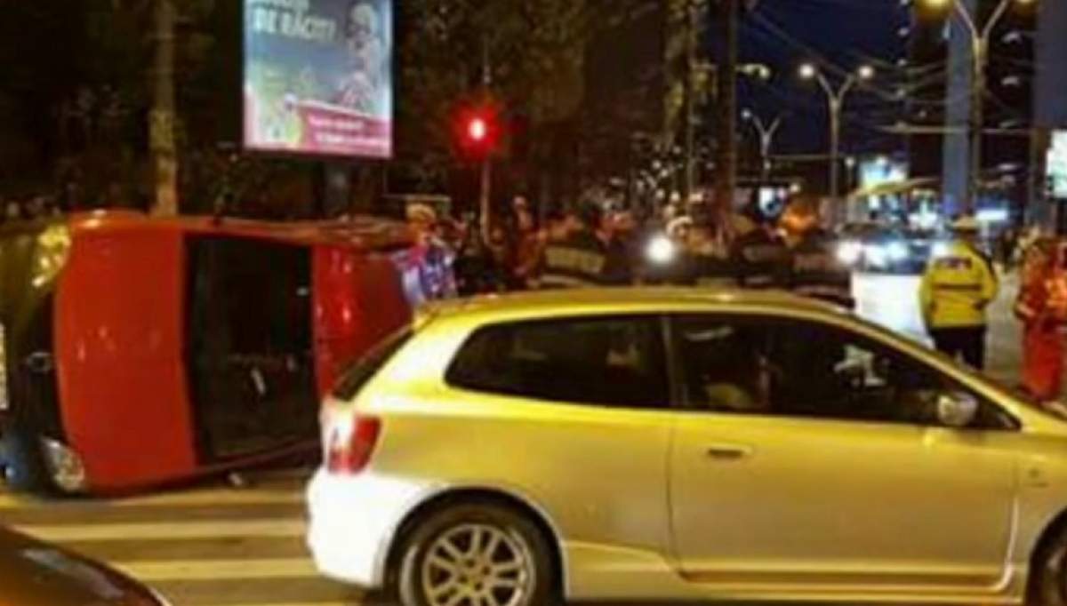 VIDEO / Accident grav în București! O mașină s-a răsturnat, după ce s-a ciocnit cu un alt autoturism