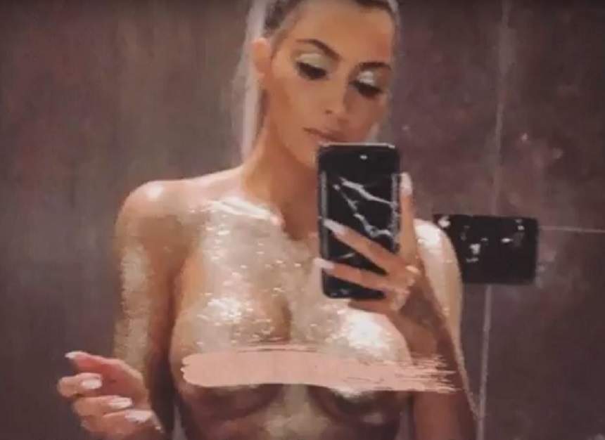 FOTO / Kim Kardashian nu lasă nimic imaginației! Vedeta a pozat goală și acoperită de aur