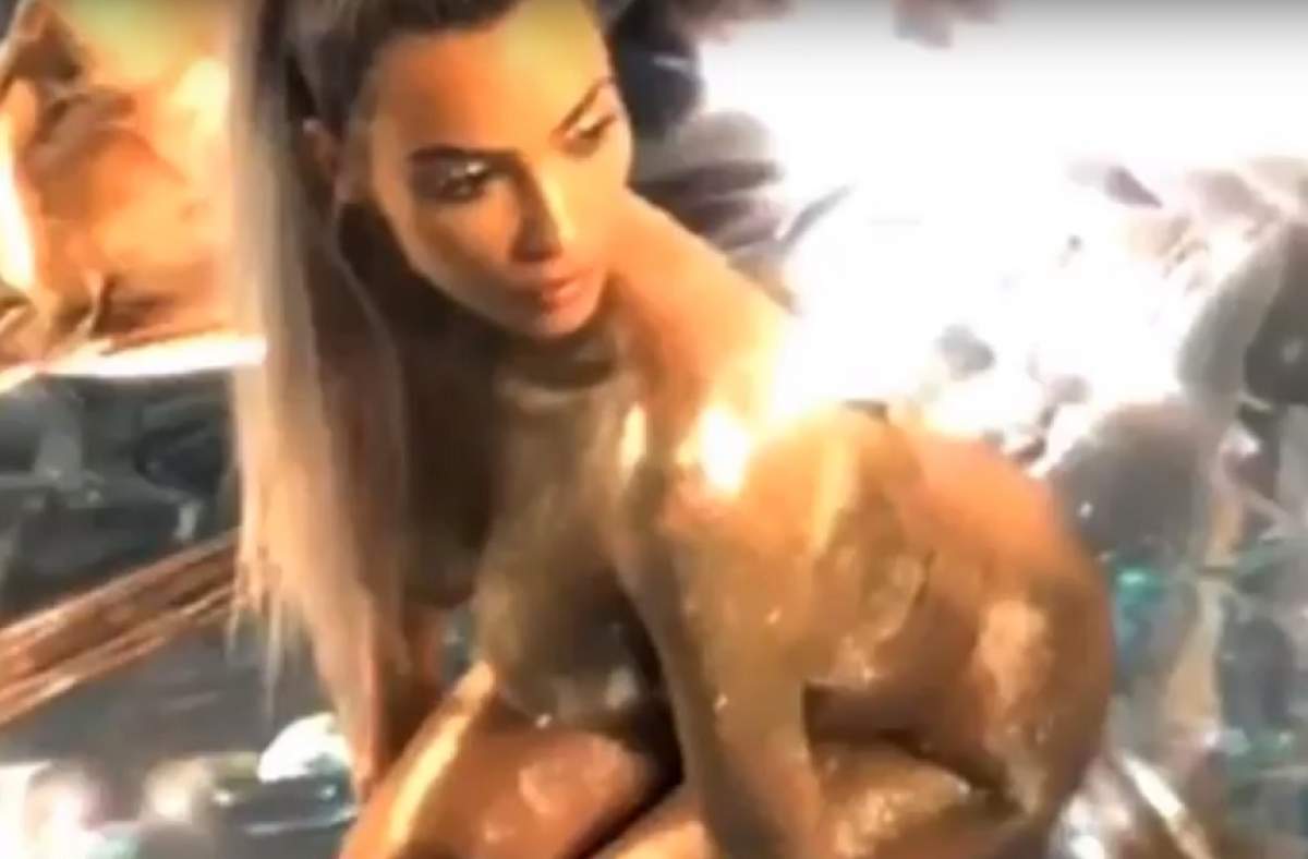 FOTO / Kim Kardashian nu lasă nimic imaginației! Vedeta a pozat goală și acoperită de aur