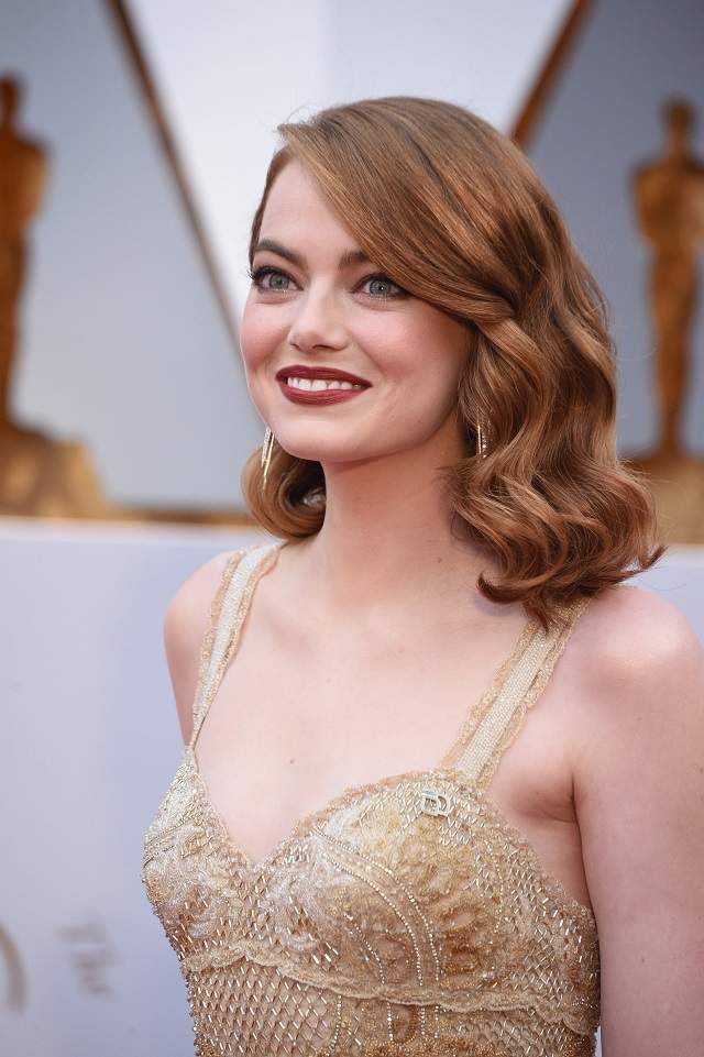 FOTO / Cea mai așteptată apariție de la Gala Premiilor Oscar! Emma Stone a venit alături de fratele ei