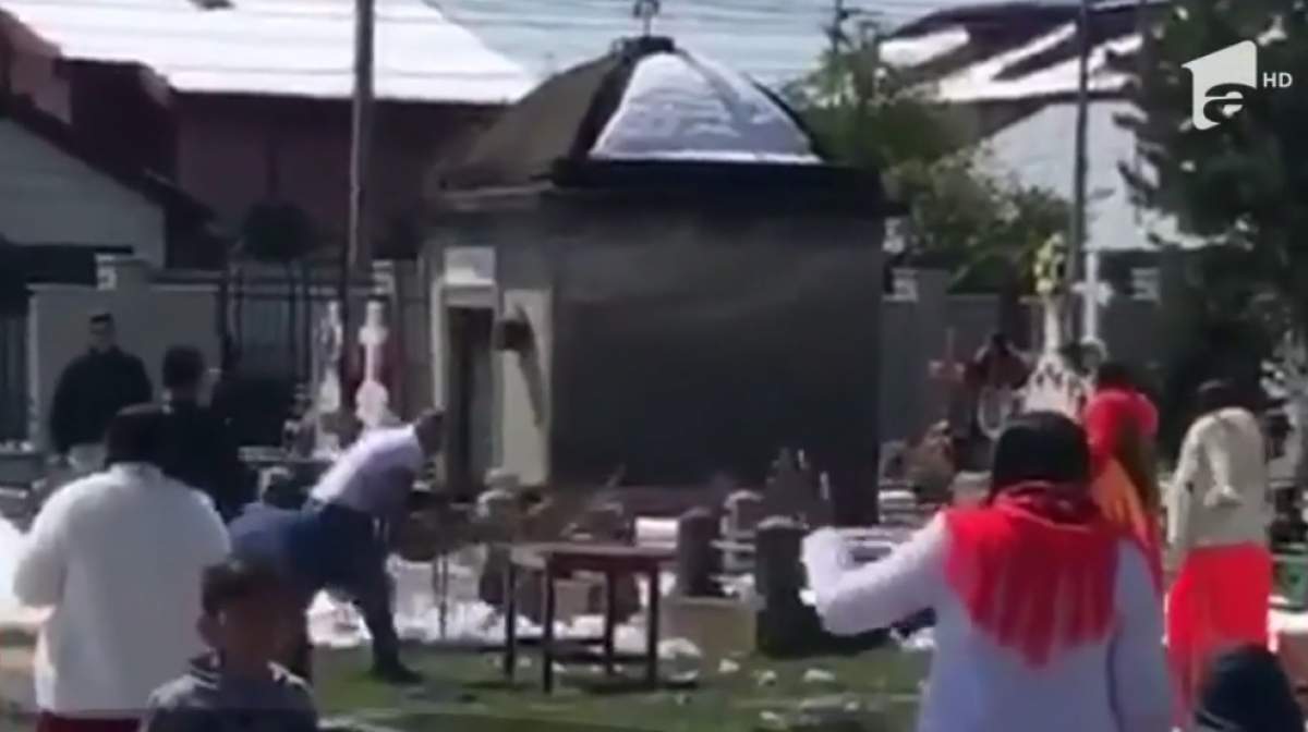 VIDEO / Bătaie cu cruci și multe înjurături într-un cimitir din Focșani! 17 persoane au fost reținute