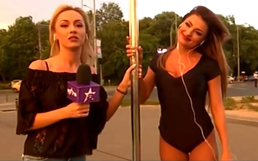 VIDEO / Cea mai sexy STARoganţă! Asistenta lui Mihai Morar dansează la bară în mijlocul intersecţiei, în ploaie