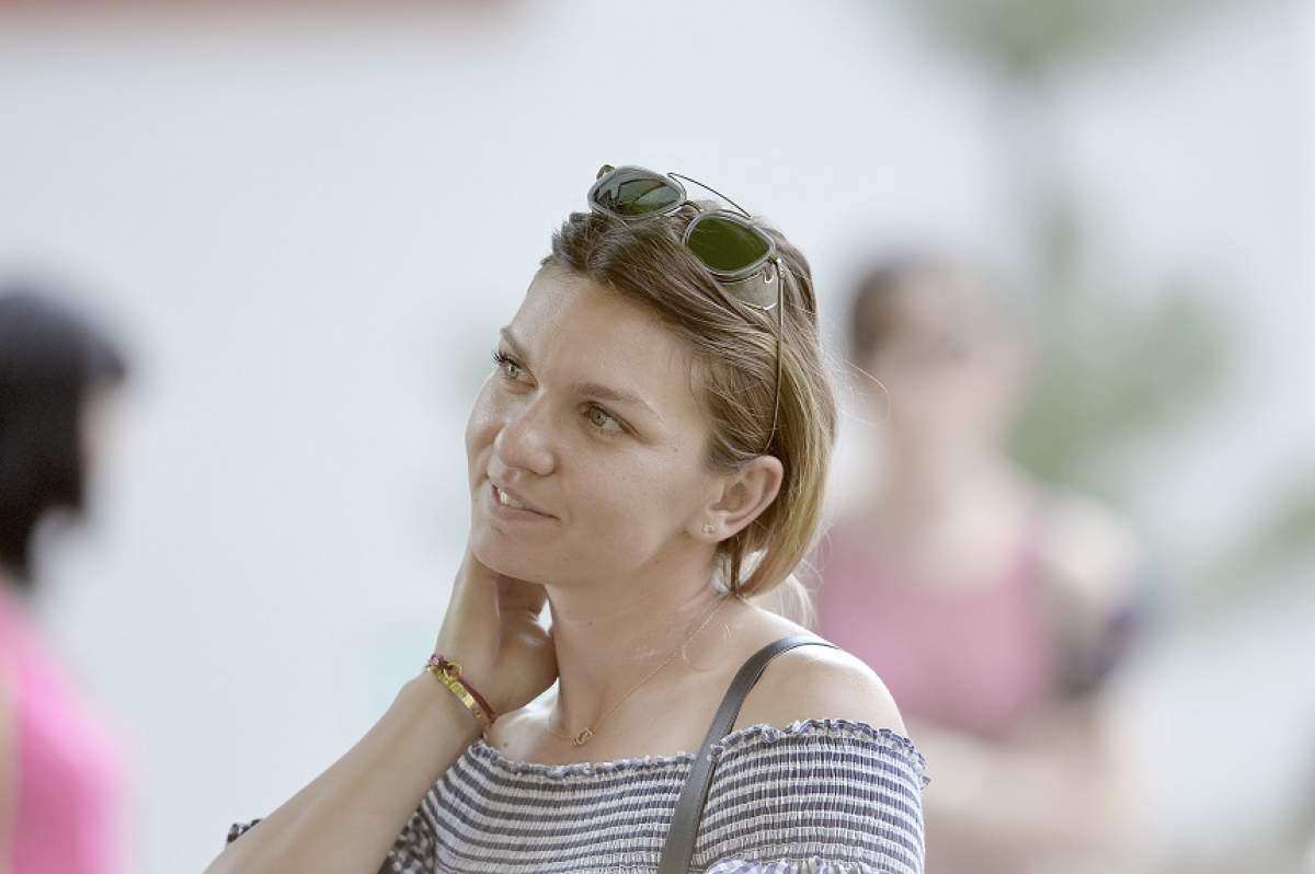 FOTO / Gata vacanţa! Simona Halep a revenit la antrenamente şi trage din greu în sala de forţă!