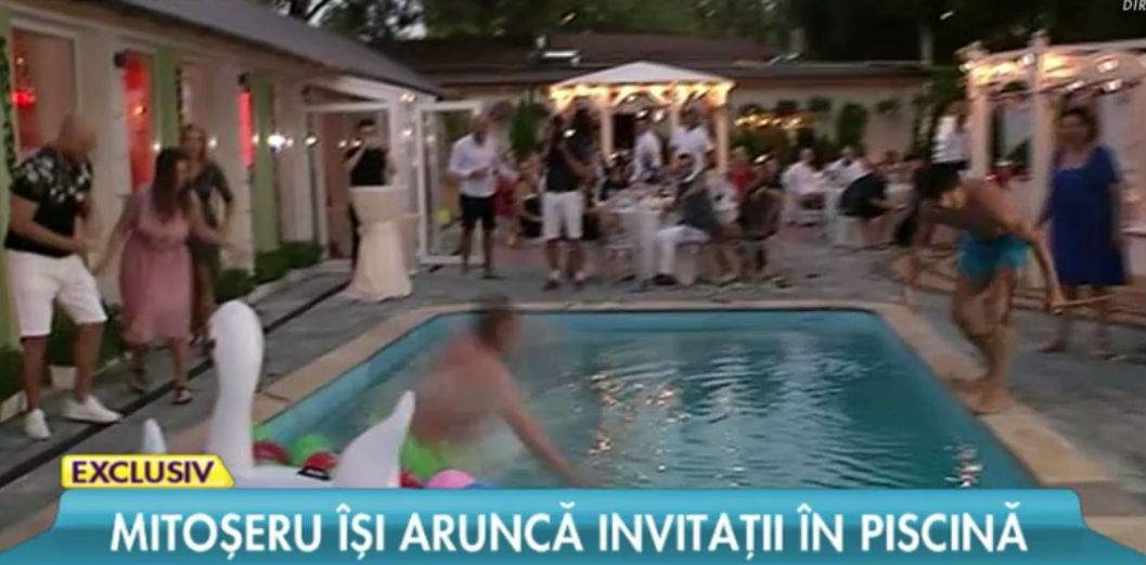 VIDEO / De ziua lui, Mitoşeru şi-a provocat invitaţii la un concurs inedit! Au tras de o funie deasupra piscinei, iar doi petrecăreţi au căzut în apă