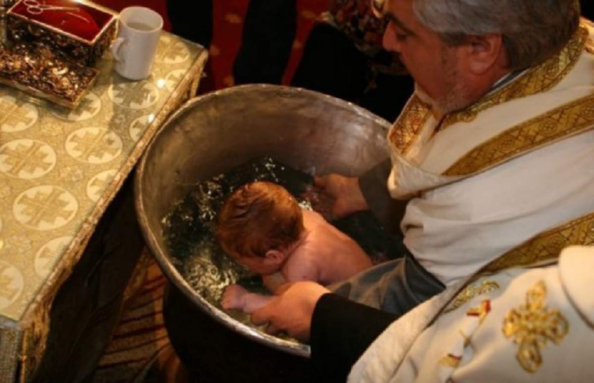 Ce s-a găsit în gura bebeluşulul din Iaşi, mort la botez! Mama lui NU avea voie să facă asta înainte de creştinare
