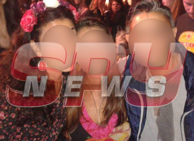 Bombă HIV în cluburile de fiţe! O individă bolnavă de SIDA se îmbracă în bărbat şi sărută pe gură femeile!