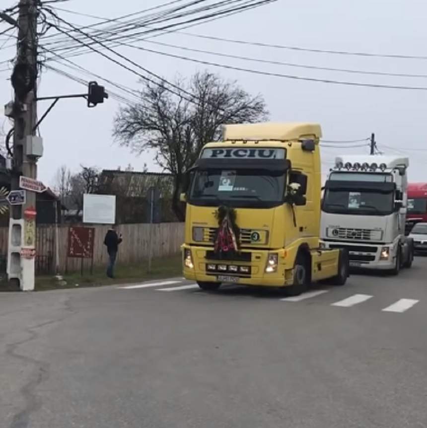 VIDEO / Cătălin Guţu a fost condus pe ultimul drum cu zeci de TIR-uri! Soţia lui însărcinată este distrusă de durere