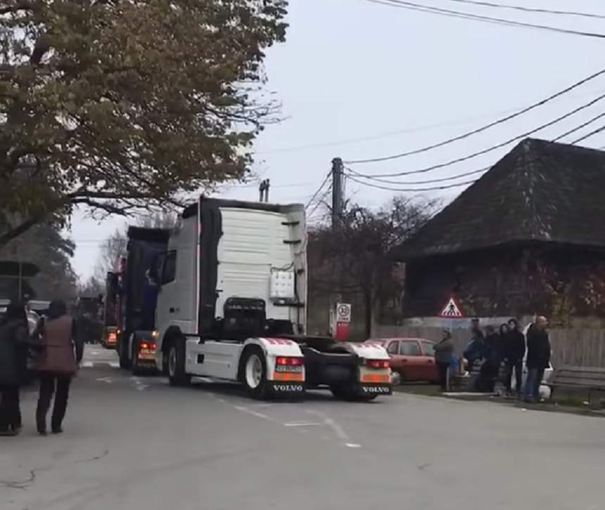 VIDEO / Cătălin Guţu a fost condus pe ultimul drum cu zeci de TIR-uri! Soţia lui însărcinată este distrusă de durere