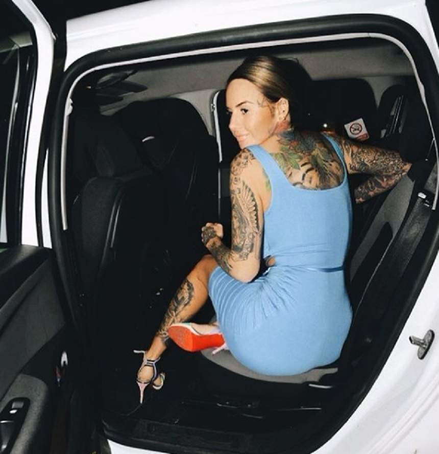 FOTO / Și-a etalat corpul sexy și tatuat, iar sânii uriași i-au ieșit din rochie! Jemma Lucy a încins temperaturile în termometre