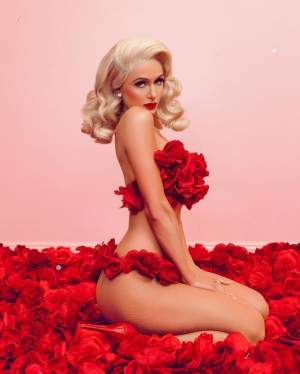 Paris Hilton, pictorial fierbinte la 36 de ani! S-a lăsat acoperită doar de trandafiri roşii: "Am nevoie de tine în patul meu"