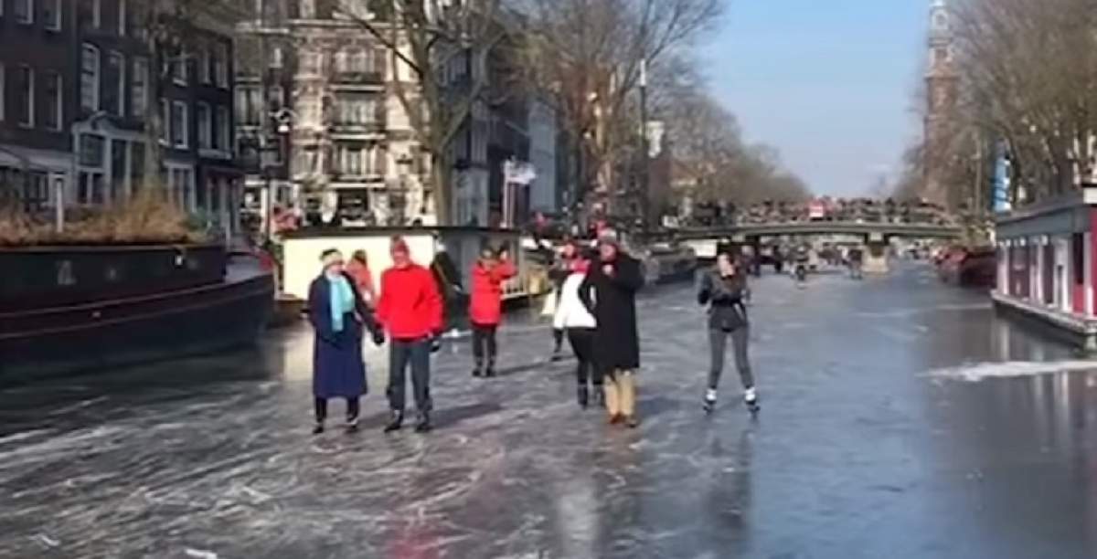 VIDEO / E atât de frig în Amsterdam, că oamenii patinează pe canale. Gerul siberian s-a abătut asupra capitalei Olandei