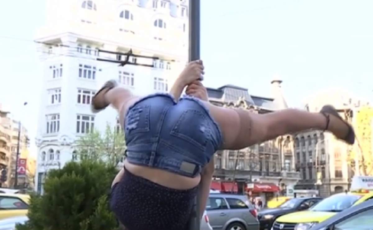 VIDEO / Dansatoarea la bară care l-a şocat pe Mihai Bendeac a dansat în mijlocul străzii, pe stâlpul de  iluminat