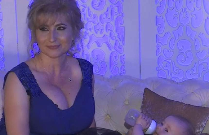 FOTO / Mama Andei Călin, extrem de elegantă şi de sexy la botezul nepoatei sale! A captat toate privirile