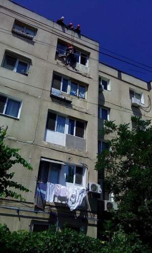 Momente de groază în București. O femeie a ameninţat că se aruncă de la etaj