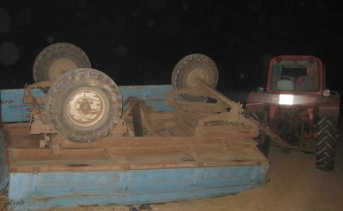 FOTO / Accident foarte grav în Suceava! O femeie de 35 de ani a murit strivită sub remorca unui tractor