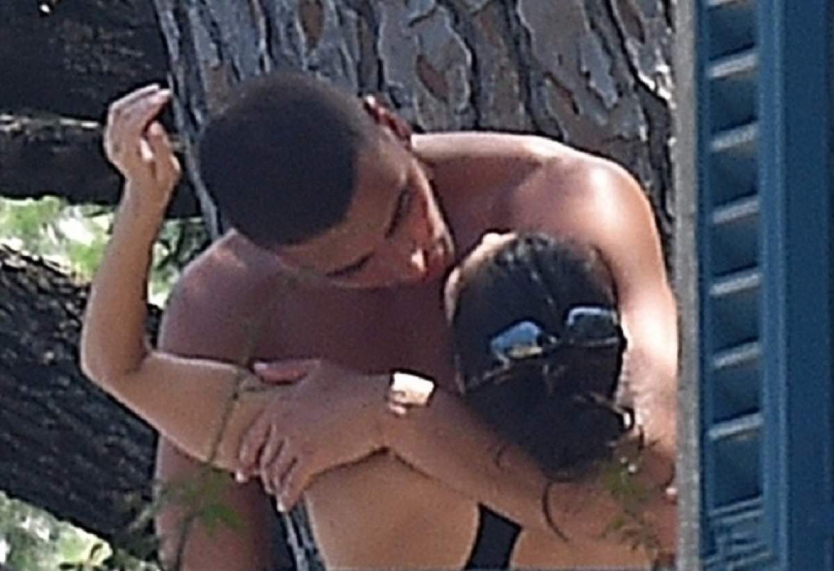 FOTO / Kourtney Kardashian şi iubitul de 24 de ani, surprinşi în cele mai tandre ipostaze! Sărutări pătimaşe în public