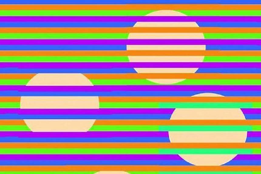 O nouă iluzie optică a devenit virală şi a stârnit isterie pe internet. Tu ce culoare vezi că au cercurile?