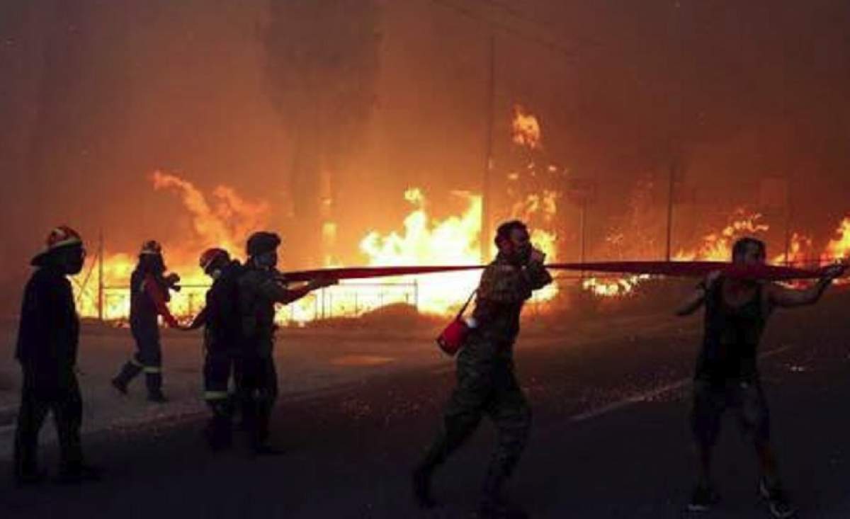 UPDATE: Numărul morţilor, în Grecia, a ajuns la 74. Sunt 150 de răniți, în urma incendiilor. Atenţionare pentru turiştii români!