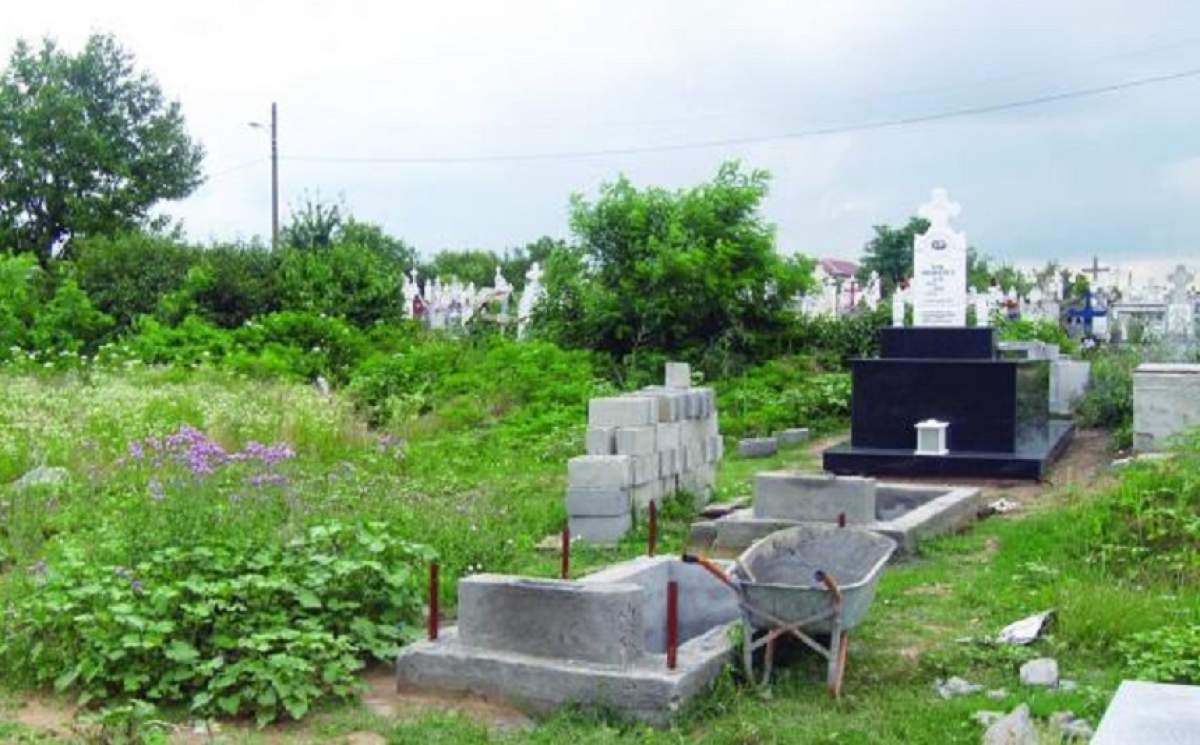 Caz halucinant! Un bărbat din Craiova a fost găsit mort în cimitir, sub o cruce