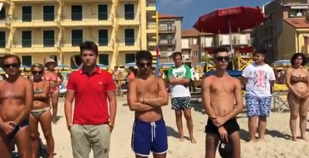 VIDEO / Moment emoționant pe o plajă din Italia. Turiștii au ținut un moment de reculegere pentru victimele de pe podul Morandi