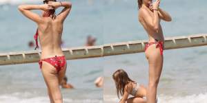FOTO / O cântăreaţă celebră, topless la plajă. S-a plimbat relaxată în văzul tuturor